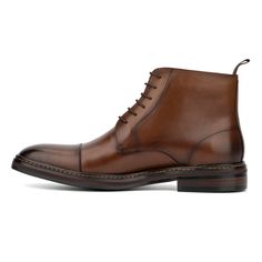 The Barnaby boot stands out with its intricate brogue details, epitomizing classic style. Its carefully designed lace-up construction ensures superior comfort and flexibility, making it a versatile choice for any occasion. Crafted with precision, the Barnaby combines elegance with practicality, offering a timeless look that never goes out of fashion. Whether for a casual day out or a formal event, these boots provide the perfect blend of sophistication and ease, making them an essential addition Brown Cap Toe Lace-up Boots With Brogue Detailing, Classic Brown Martin Boots For Business, Formal High-top Lace-up Boots With Brogue Detailing, Classic Martin Boots With Leather Sole And Plain Toe, Classic Brogue Lace-up Boots For Derby, Classic Martin Boots With Leather Sole, Classic High-top Lace-up Boots, Classic Brown Martin Boots With Plain Toe, Brown Brogue Boots For Business