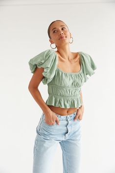 This Item is excluded from promotions. The Dottie Puff Sleeve Ruffle Crop Top is the perfect everyday top with dramatic puff sleeves that can be worn on or off the shoulders, and a tiered, cinched bodice. Featuring a square neckline and a ruffle hem. Pair with the Rolla's Heidi Jean to complete this flirty casual look. Details 80% Viscose, 20% Nylon Cropped Elastic armholes Stretchy fit Hand wash cold / Line dry American Threads, Green Square, Ruffle Crop Top, Casual Preppy Outfits, Simple Trendy Outfits, Spring Tops, Puff Sleeve Top, Dress Floral, Preppy Outfits