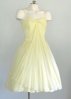 Vintage Cocktail Dress 1950s Fashion, Light Yellow Short Dress, Vintage Pleated Bodice Prom Dress, Vintage Prom Dress With Pleated Bodice, 1950s Style Yellow Party Dress, 1950s Style Spring Prom Dress, 1950s Style Summer Wedding Dress, Vintage Chiffon Dress For Formal Occasions, Retro Wedding Dress With Lined Bodice