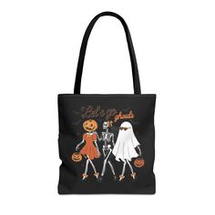 All Stickers and Purchases above $35 are eligible for free shipping  Welcome to Wild&WanderLyss! Our "Let's Go Ghouls" tote bag is perfect for carrying your Halloween essentials in style. This tote features a cute skeleton, ghost, and pumpkin design, making it practical and fashionable for the spooky season. ✧✦ PRODUCT DETAILS ✦✧      ✦ Premium quality cotton tote bag.      ✦ Durable and spacious, perfect for carrying groceries, books, and more.           ✧ 100% cotton fabric           ✧ Reinforced stitching for added durability.           ✧ Available in multiple sizes.  How Do I Order       ❶ Please review all the information provided before placing your order.      ❷ Select the tote size using the drop-down menu.      ❸ Need more items? Add the current item to the cart and press the back Casual Black Bag For Halloween, Spooky Black Bags For Halloween, Casual Black Halloween Bag, Novelty Black Bags For Halloween, Black Skull Print Bag For Halloween, Spooky Black Halloween Bags, Halloween Totes, Black Halloween Bags With Skull Print, Novelty Black Halloween Bags