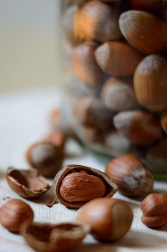 nuts in a glass jar on a table