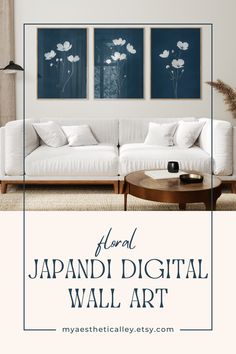 a living room with white couches and blue art on the wall above it is text that reads focal japan digital wall art