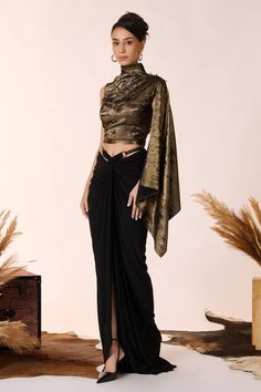 Black and gold metallic finish one shoulder draped top with gold tone motif embellishments and faux leather detailing. - Aza Fashions Gold Blouse For Party With Traditional Drape, Gold Blouse For Formal Occasion With Traditional Drape, Gold Formal Blouse With Traditional Drape, Elegant Gold Tops For Reception, Formal Gold Fitted Pre-draped Saree, Gold Pre-draped Saree For Evening With Traditional Drape, Gold Pre-draped Saree For Evening, Gold Pre-draped Saree For Party, Luxury Gold Tops For Evening