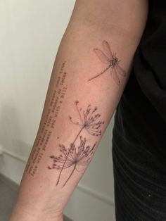 a woman with a tattoo on her arm has a quote from the poem, and a dragonfly