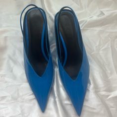 Never Worn! Blue Slingback Heels With 4-inch Heel, Blue Ankle Strap Slingback Pumps With 4-inch Heel, Blue Slingback Pumps With 4-inch Heel For Evening, Blue Slingback Pumps For Summer Evenings, Blue Slingback Pumps With Heel Strap For Summer, Blue Slingback Pumps For Spring, Blue Slingback Pumps With Open Heel For Spring, Blue Slingback Pumps With Open Heel For Summer, Chic Blue High Heel Slingback Pumps