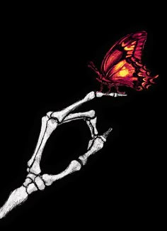 a skeleton hand holding a red butterfly on it's tip, with black background