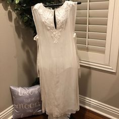 Truly Exceptional And Rare Bamford Silk Dress. Under Layer Is Silk Slip Dress. Over Layer Is Embroidered Silk, Ties On Side. Both Are Airy And Ethereal. Never Worn . Rare And Beautiful. Perfect For A Wedding , Rehearsal Or Maybe Even A Casual Beach Wedding. Elegant Embroidered Hem Midi Dress, Elegant Midi-length Embroidered Dress, Elegant Embroidered Daywear Dresses, Elegant Embroidered Day Dress, Elegant White Dress With Embroidered Hem, Elegant Embroidered Dress With Neckline Detail For Summer, Elegant Day Dresses With Embroidered Hem, Elegant White Embroidered Dress With Hem Detail, Elegant Summer Dress With Embroidered Neckline