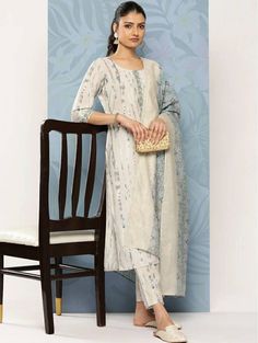 *Printed Regular Sequinned Kurta With Trousers & With Dupatta Pakistani Salwar Kameez / Indian Wedding Dress / Plus Size Cotton Dress Traditional Indian Wear / Salwar Kameez Dupatta / Kurti Palazzo Set   *Grey printed Kurta with Trousers with dupatta *Kurta design:-  *  Abstract printed   *  Straight shape   *  Regular style   *  Round neck, three-quarter regular sleeves   *  2 pockets sequinned detail   *  Calf length length with straight hem   *  Silk blend machine weave fabric *Trousers design:-  *  Printed Trousers   *  Partially elasticated waistband   *  Slip-on closure *Fabric:- Silk Blend Wash Care:- Hand Wash  AVAILABLE IN 7 SIZES THEY ARE IN FOLLOWING MEASUREMENTS IN INCHES:- XXS:- Bust-32/Shoulder-13/Top Length-45/Bottom Waist-24/Bottom Length-36/Hip-36 XS:- Bust-34/Shoulder-13. Elegant White Anarkali Set With Printed Motifs, Fitted Anarkali Set With Printed Motifs For Wedding, Elegant Cambric Anarkali Set For Navratri, Eid Wedding Palazzo Set With Printed Motifs, Cotton Palazzo Set With Printed Motifs For Wedding, Wedding Palazzo Set With Printed Motifs And Straight Kurta, Straight Kurta Lawn Suit With Printed Motifs For Wedding, Unstitched Traditional Wear For Wedding With Printed Motifs, Fitted Palazzo Set With Printed Motifs For Wedding