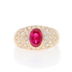 Size: 8 1/4 Sizing Fee: Up 1/2 a size for $25 or Down 1/2 a size for $25 Metal Content: 14k Yellow Gold Stone Information Synthetic Ruby Carat(s): 1.55ct Cut: Oval Color: Pinkish Red Cubic Zirconia Carat(s): .68ctw dew Cut: Round Brilliant Color: Clear Total Carats: 2.23ctw Style: Solitaire with Accents Measurements Face Height (north to south): 7/16" (10.8mm) Rise Above Finger: 3/16" (4.4mm) Weight: 3.8 Grams Stamps: 14k, DQ JC Condition: Pre-Owned Professionally cleaned, polished, and tested to guarantee metal content. Crossover Ring, Sapphire Diamond Ring, Ruby Stone, Modern Ring, Cubic Zirconia Rings, La Face, Gold Stone, Sapphire Diamond, Cultured Pearls