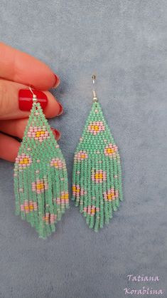 These handmade author's earrings are made of high-quality Czech beads and strong synthetic thread. In these unique earrings I use my author's scheme Flowers (Abstract minimalism). They are elegant, fashionable, and highly versatile, suitable for everyday wear. Color: base color-pastel green(mint) and other colors(pink,mint, yellow). I beg you not to copy my authoring 100% hand made with love! Measurements: Length- near 10cm(3.94inch),Width -3 cm(1.18 inch) Materials: Sterling silver components C Handmade Pastel Dangle Earrings, Handmade Green Beaded Earrings For Spring, Green Beaded Earrings As A Spring Gift, Handmade Green Tassel Earrings For Summer, Handmade Dangle Earrings For Spring, Green Handmade Tassel Earrings For Summer, Spring Dangle Beaded Earrings, Handmade Pastel Jewelry For Spring, Green Beaded Earrings For Crafting In Summer