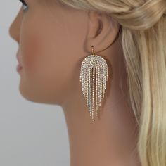 These Beautiful Romantic LONG Chandelier tassel Drop CRYSTAL BRIDAL EARRINGS are crafted with the finest quality of Swarovski Crystals, known for their exceptional brilliance and sparkle. These earrings are designed to add a touch of elegance and glamour to any bridal look, and the intricate design and radiant shine make them truly special. Even we had a hard time taking pictures because of their shine 😄 so we want to shine our brides on their special days. We understand the importance of a com Elegant Fringe Jewelry For Weddings, Elegant Fringed Jewelry For Weddings, Dangle Rhinestone Fringe Jewelry For Weddings, Elegant Crystal Earrings With Rhinestone Fringe For Wedding, Wedding Chandelier Earrings With Rhinestone Fringe, Glamorous Wedding Chandelier Earrings With Rhinestone Fringe, Dangle Rhinestone Fringe Earrings For Weddings, Crystal Tassel Drop Earrings For Wedding, Rhinestone Fringe Dangle Earrings For Weddings