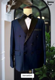 Elevate your style with our exquisite Navy Blue Suit for Men. Crafted with precision and attention to detail, this timeless classic is ideal for weddings, formal events, and special occasions. Our Suits features a slim-fit design, ensuring a sharp, tailored look that combines comfort and sophistication. * Unmatched Elegance: This Mavy Blue suit exudes refined elegance, making you stand out on your big day. * High-Quality Fabric: Crafted from premium materials for ultimate comfort and durability. Single Breasted Tuxedo For Wedding, Single-breasted Tuxedo For Wedding, Wedding Tuxedo Single Breasted, Elegant Wedding Tuxedo In Suiting Fabric, Elegant Tailored Double Breasted Suit With Hidden Buttons, Evening Suits With Suit Collar And Fitted Style, Tailored Double Breasted Suit With Hidden Button, Designer Double Breasted Notch Lapel Suit For Semi-formal Occasions, Elegant Single Breasted Tuxedo For Wedding