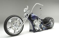 a motorcycle is shown with chrome rims on it's tires and the front wheel