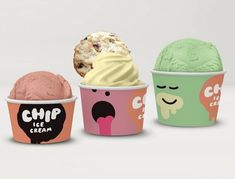 three ice cream cups with different flavors in them