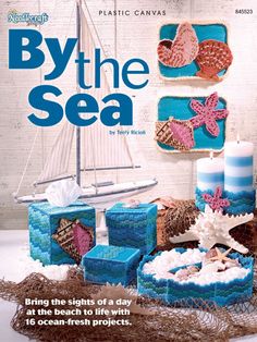 a magazine cover with candles and sea shells