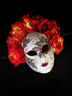 Make a bold statement with this Red Floral Mask from the Embroidered Venetian Passion Bloom collection. Adorned with fiery red and yellow flowers, this mask features intricate embroidery and elegant detailing, perfect for masquerade balls, special events, or themed parties. Its stunning floral design and traditional Venetian craftsmanship make this mask a show-stopping accessory for any occasion.

Age Group/Gender - Adult/Women

Size/Type - One size fits all adults

Mask Color -  Red/Green/Yello Kids Party Packs, Floral Mask, Red And Yellow Flowers, Red Mask, Female Mask, White Mask, Embroidery Shop, Masquerade Ball, Fiery Red