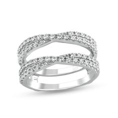 Complete your bridal look with the elegant details of this diamond criss-cross enhancer in 14K white gold. Crafted in 14K white gold This double-sided design features split diamond-lined crossover ribbons. This 1/2 ct. t.w. diamond enhancer is designed to surround your solitaire or other ring style. Ring Enhancer Wedding Band Emerald, Zales Rings, Engagement Ring Wraps, Wedding Ring Guard, Diamond Enhancer, Enhancer Wedding Band, Ring Enhancer, Ring Guard, Bridal Look