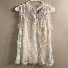 Who What Wear Cream Sheer Embossed Blouse With Camisole. Sleeveless, Size M. Nwt. Armpit To Armpit 20”, Waist 21”, Length 26”. This Is A Lovely Top! Spring Cami Vest Blouse, Sheer Camisole Tank Top For Spring, Sheer Sleeveless Tank Top For Spring, Spring Sheer Tank Camisole, Sheer Sleeveless Top For Spring, Sleeveless Sheer Lace Tops, Casual Sheer Sleeveless Camisole, Elegant Sheer Sleeveless Tank Top, Elegant Sleeveless Sheer Blouse