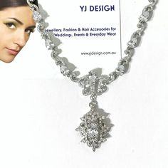 "A glamourous semi parure Victorian wedding vintage style bridal jewelry set with cz dangle earrings and statement necklace featuring intricately detailed Fleur de Lis Damask royalty inspired motifs. They are made of high quality clear cubic zirconia with earrings on sterling silver posts, all framed in white gold silver rhodium tarnish-resistant finish. Earrings are 1 3/8\" (3.5cm) including cz-studded sterling silver posts. Necklace length is adjustable at min 16.5\" (42cm) and max 18.5\" (47c Glamorous Hand-set Wedding Necklace, Glamorous Hand Set Necklaces For Wedding, Glamorous Hand Set Necklace For Wedding, Party Bridal Necklace With Intricate Cubic Zirconia Design, Glamorous Diamond Rhinestone Necklace For Wedding, Glamorous Wedding Jewelry With Intricate Design, Glamorous Diamond Bridal Necklace For Wedding, Glamorous Hand Set Bridal Earrings For Wedding, Elegant Rhinestone Necklace For Wedding