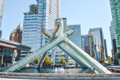 a large metal sculpture in the middle of a city