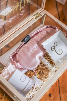 the bride's gift box is filled with personal items