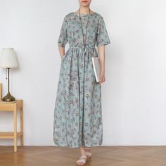 Spring Bohemian Maxi Dress With Drawstring, Bohemian Spring Maxi Dress With Drawstring, Bohemian Maxi Dress With Drawstring For Spring, Casual Tied Dresses For Spring, Casual Spring Dress With Tied Details, Casual Tie Waist Maxi Dress For Spring, Casual Spring Maxi Dress With Tie Waist, Relaxed Fit Summer Dress With Drawstring, Summer Dresses With Drawstring And Relaxed Fit