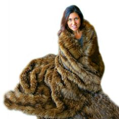 a woman in a fur coat posing for the camera