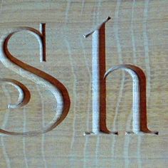 the word shii is carved into wood