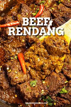 beef rendang with carrots and peppers in a skillet