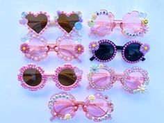 These fun rainbow sprinkle sunglasses fit most 2-8 year olds. Cute Summer Sunglasses For Birthday, Fun Pink Sunglasses For Gift, Fun Pink Handmade Sunglasses, Handmade Sunglasses For Summer Parties, Fun Handmade Sunglasses As A Gift, Pink Tinted Sunglasses As Gift, Fun Handmade Pink Sunglasses, Handmade Fun Pink Sunglasses, Playful Multicolor Party Sunglasses