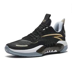 The ANTA Shock Wave 5 Team 'Black Golden' is a stylish and modern sneaker. Its silhouette is inspired by the latest trends, and its black and golden colorway is sure to make a statement. The sole is made of a durable material, providing a comfortable experience for everyday activities and work. The product series is designed to make a bold statement, and the 'Black Golden' edition is sure to stand out. Perfect for those who want to make a statement with their style. Black Lace-up Basketball Shoes, Black Shock Resistant Synthetic Sneakers, Black Low-top Dynamic Basketball Shoes, Black Low-top Shock Resistant Sneakers, Dynamic Black Low-top Basketball Shoes, Black Sneakers With Shock Absorption For Light Sports, Black Shock Resistant Casual Sneakers, Casual Black Shock-resistant Sneakers, Fade-resistant Black Basketball Shoes For Streetwear