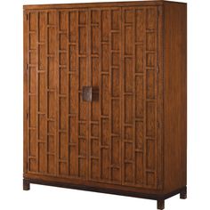 a wooden cabinet with two doors on the front and one door open to reveal an intricate design