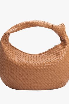 The Brigitte is a fine example of our attention to detail and quality. Its intricate basket woven handmade design and buttery soft feel add a touch of luxury to this understated hobo bag. The slouchy shape allows it to fit perfectly under your arm. Features interior zip and slot pockets. Luxury Vegan Leather 16"W x 10"H Handle Drop: 4" Zipper Closure Gold-Tone Hardware Interior Zip & Slot Pockets Signature Polka Dot Lining Fits up to an iPad Mini Everyday Use Top Handle Hobo Bag With Interwoven Design, Everyday Double Handle Shoulder Bag With Interwoven Design, Everyday Shoulder Bag With Top Handle And Interwoven Design, Everyday Shoulder Bag With Double Handle And Interwoven Design, Everyday Shoulder Bag With Interwoven Design And Double Handle, Everyday Bucket Hobo Bag With Intrecciato Weave, Chic Shoulder Bag With Interwoven Design And Double Handle, Chic Top Handle Shoulder Bag With Interwoven Design, Brown Hobo Bag With Round Handle For Everyday