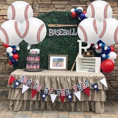 a baseball themed birthday party with balloons and decorations