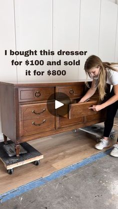 a woman is placing drawers on top of a wooden dresser with the words, i bought this dresser for $ 10 and sold it for $ 800