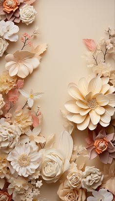 an arrangement of paper flowers on a beige background