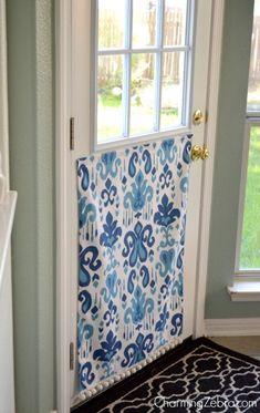 the door is decorated with blue and white designs