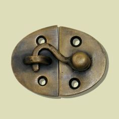 an antique brass plated door handle with two holes