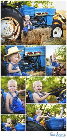 a little boy sitting on top of a blue tractor