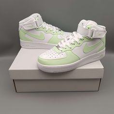 Experience the ultimate combination of style and comfort with our Nike Air Force 1 Light Green Custom. Crafted with precision and expertise, our custom design features a light green colorway that will elevate any outfit. Embrace the iconic Nike brand while feeling light on your feet. ★ Brand new with box ★ Each pair is unique and one of a kind ★ Each pair is personally handmade, painted with high quality Angelus. ★ Leather acrylic paint. Topped with a clear coat for extra protection. ★ Available Nike Brand, 12th Man, Clear Coat, Nike Air Force 1, Air Force 1, Nike Air Force, Acrylic Paint, Light Green, Air Force