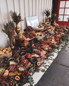 a table filled with lots of different types of food