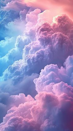 the sky is filled with many clouds and some bright blue, pink, and yellow colors