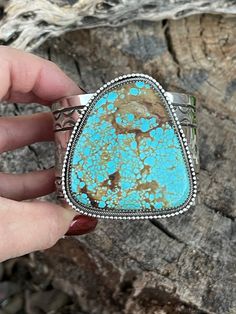 Look at this amazing Number 8 Turquoise and Sterling Silver Statement cuff. Measuring 2 1/4 inches wide. With an inner circumference of 5 3/4 inches and 1 1/4 inch gap . Weight 188 grams. Signed by Artist and stamped Sterling . This is a Beautiful Solid Cuff.Thank you for looking at our items. Please contact us if you have any questions.8/15/22 INV Silver Numbers, Number 8, Bracelet Cuff, Turquoise Bracelet, Cuff Bracelets, 4 Inch, Gap, Cuff, Turquoise