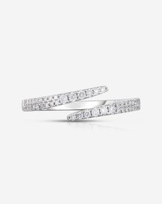 two white gold rings with diamonds on them