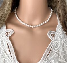 "✦Small baroque pearl choker has a vintage style and makes a wonderful gift for a daughter from a mom as a bridal engagement heirloom necklace. It also makes a perfect piece as an anniversary gift for the wife. ✦The baroque pearls measure 6mm x 8mm and have a beautiful luster. The choker comes in lengths from 14 inches to 20 inches long with a 2\" inch length adjustment.  Closes with a small sterling silver lobster heart clasp. Please select necklace length at check out. ✦Your jewelry will be packaged in a beautiful and reusable organza bag. All items will be placed in the same organza bag. If you need a separate bag for each item, please leave a comment at check out. ✦Giving your purchase as a gift? If you would prefer that prices not be printed on your invoice, please check \"this item i Heirloom Necklace, Pearl Strands Necklace, Bridal Pearl Necklace, June Birthday, Pearl Strand, Necklace Bridal, String Of Pearls, Baroque Pearl Necklace, Bride Accessories