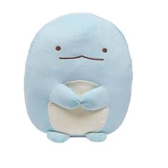 a blue stuffed animal with a frown on it's face