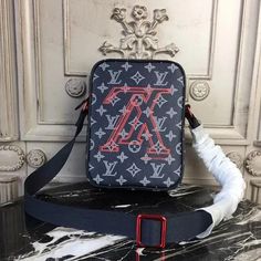 ® Description: Upside-down, these LV Initials are a hallmark of the Men’s 2018 Fall Pre-collection. Designed by Kim Jones the bold pink logo emblazons this Danube PM city bag, crafted of Monogram Ink canvas. Compact, yet roomy enough for essential belongings, it features an adjustable strap for shoulder- or cross-body wear. Size: 8.7 x 6.3 ... Kim Jones, Bag Louis Vuitton, City Bag, Pink Logo, The Men, Lv Bag, Coral Pink, Online Branding, Upside Down