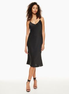 V-neck Midi Dress With Adjustable Straps For Date Night, Sleek Satin Midi Dress With Spaghetti Straps, Sleek Summer Slip Dress With Built-in Bra, V-neck Bias Cut Slip Dress For Date Night, Adjustable Straps Knee-length Slip Dress For Date Night, Sleek Midi Slip Dress For Summer, Sleek Midi-length Slip Dress For Summer, Sleek Summer Midi Slip Dress, Fitted Spaghetti Strap Midi Dress For Night