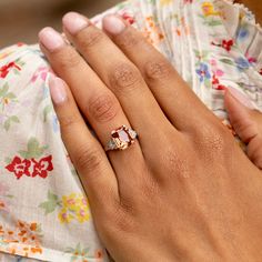 The Story Beautiful in color and style, this vintage ring will stop you in your tracks. Done in platinum, it centers around a gorgeous Imperial Topaz weighing approximately 4.80 carats. The stone sits in a four-prong setting with six single cut diamonds, each weighing approximately 0.03 carats, tapering down the sides. The unique stone has the most beautiful hue. In the orange-pink family, it looks like a sunset. Measuring 0.4 inches tall it looks amazing on the finger. A ring like this is a jewelry staple you'll wear for years to come. The Specs Style Number: R2542 Vintage, circa late 20th century Platinum Imperial Topaz, 4.80 carats, 10.4 x 9.1 mm (approx.) 12 single cut diamonds, each 0.03 carats (approx.) Total diamond weight approximately 0.32 carats Height of front face of ring 0.40" Jewelry Staples, Imperial Topaz, Front Face, Locket Charms, Platinum Ring, Late 20th Century, Vintage Ring, Locket Necklace, Orange Pink