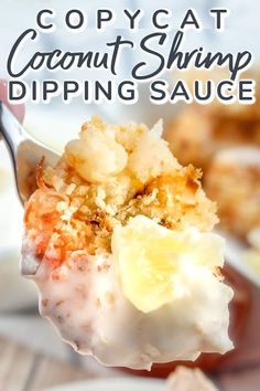 a spoonful of coconut shrimp dipping sauce with a bite taken out of it